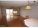 Spacious living room with hardwood floors and access to a screened lanai at 4773 E Hopi St, Phoenix, AZ 85044