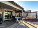 Relaxing backyard with a covered patio, outdoor seating and a charming porch swing at 5361 N 77Th Ln, Glendale, AZ 85303