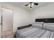 Bedroom showcasing a ceiling fan, and comfortable bedding at 5361 N 77Th Ln, Glendale, AZ 85303
