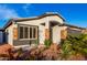 Suburban house featuring desert landscaping, neutral colors and an inviting entryway at 5361 N 77Th Ln, Glendale, AZ 85303