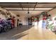 Well-organized two-car garage with storage, ample workspace, and a secure entrance at 5361 N 77Th Ln, Glendale, AZ 85303