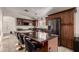 Stylish kitchen featuring a large island, stainless steel appliances, and abundant cabinet space at 5361 N 77Th Ln, Glendale, AZ 85303