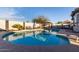 Sparkling pool area featuring lounge chairs and a pergola, perfect for relaxation at 5361 N 77Th Ln, Glendale, AZ 85303
