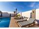 Refreshing pool featuring poolside lounge chairs and lush landscaping, great for entertaining at 5361 N 77Th Ln, Glendale, AZ 85303