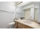 Bathroom features an undermount sink with marble countertop and decorative towels and accents at 5741 N 44Th Ln, Glendale, AZ 85301