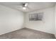 This bedroom features neutral carpet and a window with lots of natural light at 5741 N 44Th Ln, Glendale, AZ 85301