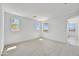 Spacious bedroom with neutral carpet and windows for ample natural light at 5875 N 193Rd Dr, Litchfield Park, AZ 85340