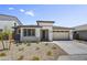 Charming single-story home with a well-manicured desert landscape in a residential neighborhood at 5875 N 193Rd Dr, Litchfield Park, AZ 85340