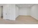 Open-concept living space with hardwood flooring and neutral walls at 5875 N 193Rd Dr, Litchfield Park, AZ 85340
