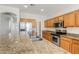 Updated kitchen featuring stainless steel appliances and granite counters at 6615 S 25Th Dr, Phoenix, AZ 85041