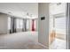 Spacious main bedroom with multiple windows, and ensuite bathroom at 6615 S 25Th Dr, Phoenix, AZ 85041