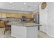 Well-appointed kitchen features wooden cabinetry, granite countertops, stainless steel appliances and large island at 7628 W Donald Dr, Peoria, AZ 85383