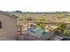 Inviting backyard pool with desert landscape, perfect for relaxation at 7628 W Donald Dr, Peoria, AZ 85383