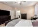 Well lit bedroom with carpeting, ceiling fan and plenty of closet space at 8105 W Groom Creek Rd, Phoenix, AZ 85043