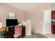 Loft area featuring a desk, chair, and a view of the home's entrance at 8105 W Groom Creek Rd, Phoenix, AZ 85043