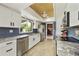 Stylish kitchen featuring stainless steel appliances, granite countertops, and modern white cabinetry at 8317 E Via De La Escuela --, Scottsdale, AZ 85258