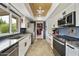 Modern kitchen featuring stainless steel appliances, granite countertops, and ample cabinet space at 8317 E Via De La Escuela --, Scottsdale, AZ 85258
