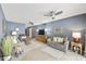 Inviting living room featuring a ceiling fan, comfortable seating, and stylish decor at 8317 E Via De La Escuela --, Scottsdale, AZ 85258