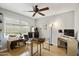 Office with modern ceiling fan, spacious desk area, wood flooring, and ample natural light at 8317 E Via De La Escuela --, Scottsdale, AZ 85258