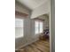 Bedroom featuring large mirror closet doors and bright light from the windows at 8700 E University Dr # 953, Mesa, AZ 85207