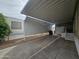 Spacious covered carport providing ample parking space and protection from the weather at 8700 E University Dr # 953, Mesa, AZ 85207