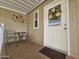 Inviting front porch with seating, perfect for enjoying the outdoors at 8700 E University Dr # 953, Mesa, AZ 85207