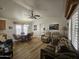 Inviting living room with lots of space, and a ceiling fan, perfect for relaxing or entertaining guests at 8700 E University Dr # 953, Mesa, AZ 85207
