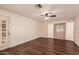 Spacious bedroom features modern flooring and a ceiling fan for comfort and air circulation at 9136 W Sequoia Dr, Peoria, AZ 85382