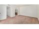 Bedroom showing bathroom and closet, with carpeted floors and neutral wall color at 914 N Cherry --, Mesa, AZ 85201
