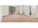 Spacious carpeted bedroom featuring a closet, a sliding glass door, and neutral tones for a calming atmosphere at 914 N Cherry --, Mesa, AZ 85201