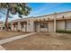 Home exterior with awnings, front porch and mature landscaping at 914 N Cherry --, Mesa, AZ 85201