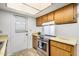 Efficient kitchen featuring modern stainless steel appliances, sleek countertops, and ample cabinet storage at 914 N Cherry --, Mesa, AZ 85201
