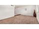 Spacious living room with neutral walls and carpeting, offering a versatile layout for various furnishings at 914 N Cherry --, Mesa, AZ 85201