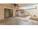 Covered patio offers seamless outdoor living with ceiling fan and access to backyard at 914 N Cherry --, Mesa, AZ 85201