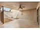 Covered patio featuring brick accents and ceiling fan, creates a cozy outdoor space at 914 N Cherry --, Mesa, AZ 85201