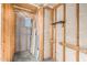 Exposed studs and electrical box in a room undergoing renovation at 914 N Cherry --, Mesa, AZ 85201