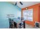 Colorful dining room with table and view of backyard pool at 10318 W Luke Ave, Glendale, AZ 85307