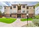 Beautiful exterior view of the apartment complex on a sunny day with a manicured lawn and mature landscaping at 14950 W Mountain View Blvd # 5312, Surprise, AZ 85374