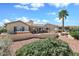 Beautiful backyard with a hot tub, covered patio, and ample space for outdoor entertaining and relaxation at 15546 W Whitton Ave, Goodyear, AZ 85395