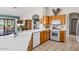 Well-appointed kitchen featuring modern appliances, plenty of counter space, and bright lighting at 15546 W Whitton Ave, Goodyear, AZ 85395