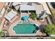 Aerial view of a private pool with a lounge area and a covered patio, perfect for outdoor entertaining at 2328 N 123Rd Ln, Avondale, AZ 85392