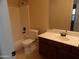 Bathroom with a shower/tub combo and updated vanity at 25176 W Cranston Ln, Buckeye, AZ 85326