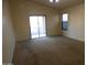 Bedroom with access to a patio or backyard at 25176 W Cranston Ln, Buckeye, AZ 85326