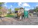 Community playground featuring a slide, covered picnic area, and sandy play area at 2727 N Price Rd # 26, Chandler, AZ 85224