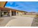 Desert landscaped front yard with covered entrance and rock ground covering, showcasing curb appeal at 2830 E Fruitvale Ave, Gilbert, AZ 85297