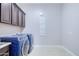 Laundry room featuring a sink, dark wood cabinets, and high-efficiency washer and dryer at 2830 E Fruitvale Ave, Gilbert, AZ 85297