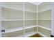 Walk-in pantry with white shelving provides ample storage at 2830 E Fruitvale Ave, Gilbert, AZ 85297