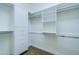 Well-organized walk-in closet with built-in shelves and drawers at 2830 E Fruitvale Ave, Gilbert, AZ 85297