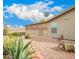 The exterior view shows a beautiful Arizona room addition perfect for relaxing and entertaining at 3301 S Goldfield Rd # 2105, Apache Junction, AZ 85119