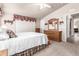 Bright main bedroom with a vaulted ceiling, and light-colored walls at 3301 S Goldfield Rd # 2105, Apache Junction, AZ 85119